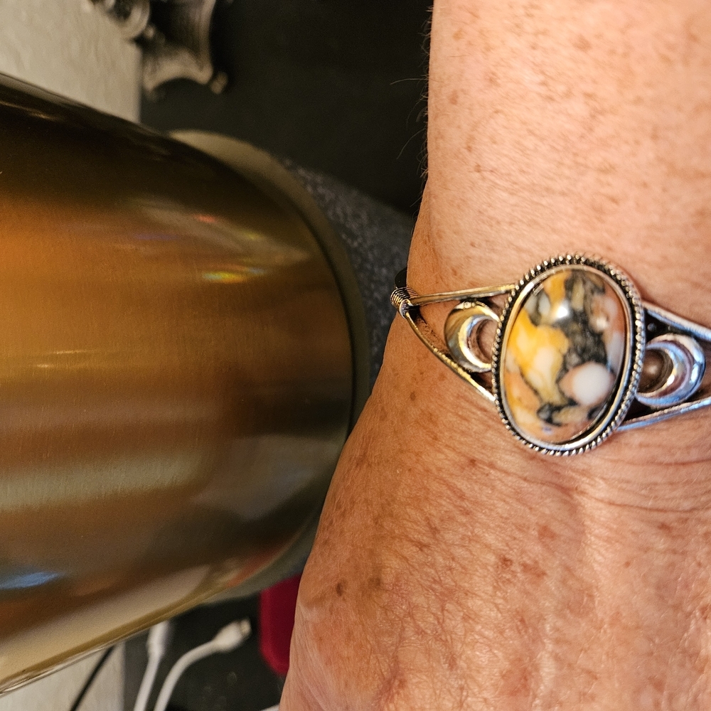Silver and Gold Celtic-Inspired Bracelet with Oval Medallion